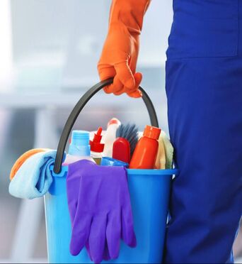 Cleaning tools and detergents in bucket