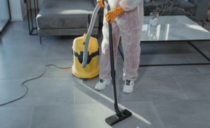 Cleaner vacuuming living area
